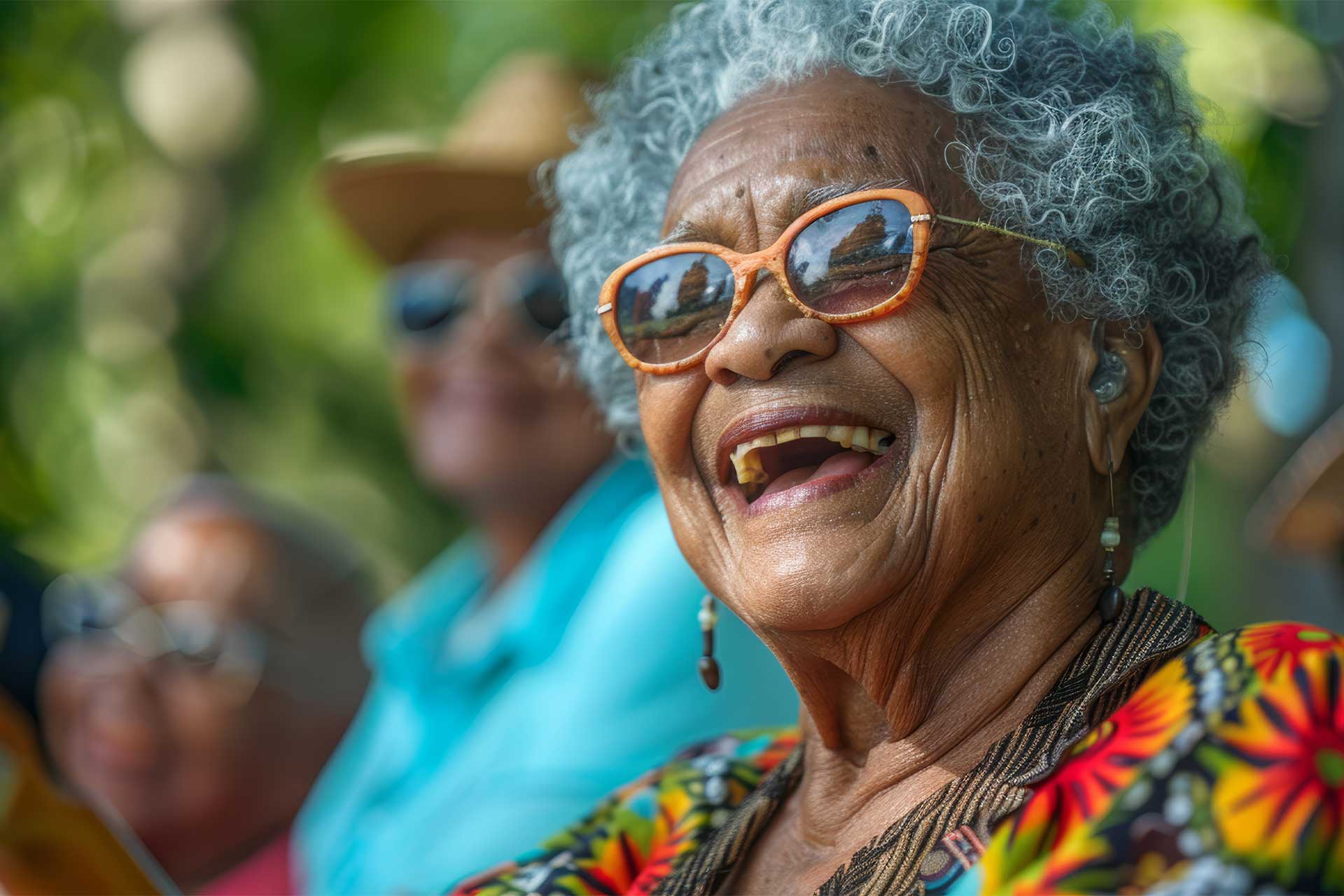 Resident listening to live music outside on a nice day.